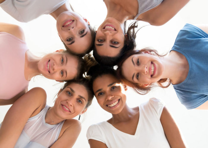 Diverse group of young sporty attractive girls enjoy time togeth Diverse group of young sporty attractive girls enjoy time togeth